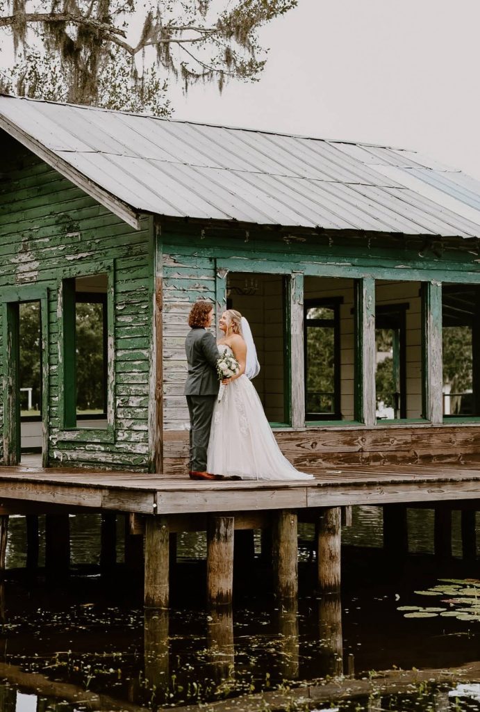 Wedding coordination team setting up a reception at The Barn at Crescent Lake in Tampa, Florida
