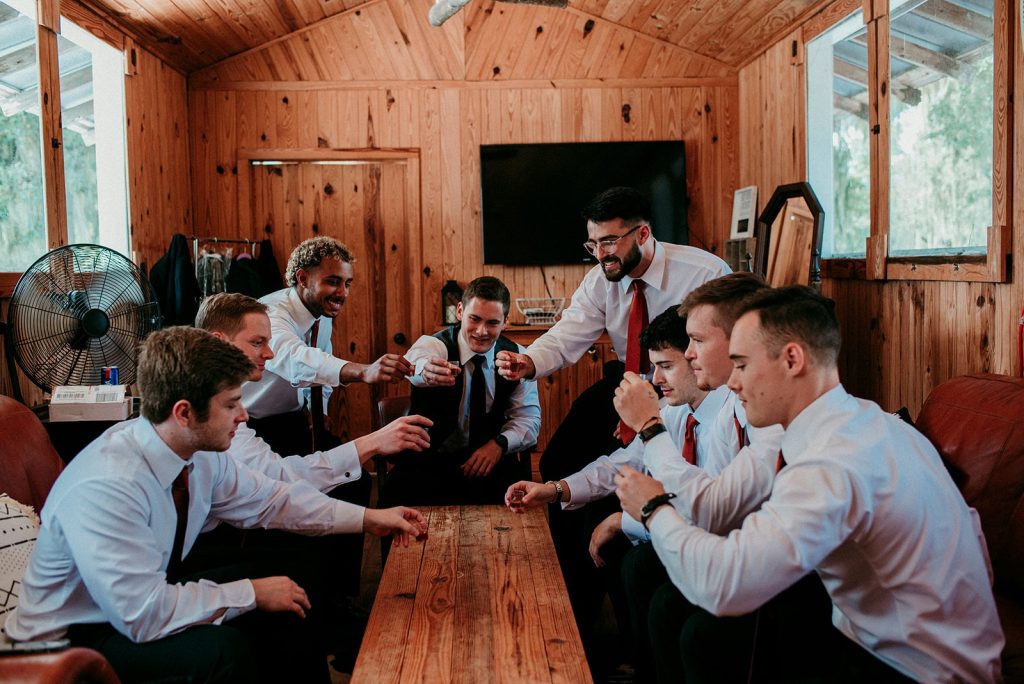 Groom and groomsmen relaxing